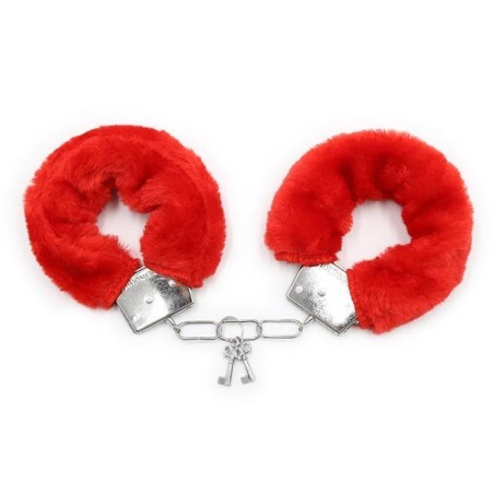 Esposas de metal para muñecas con pelo rojo