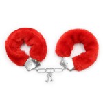 Esposas de metal para muñecas con pelo rojo