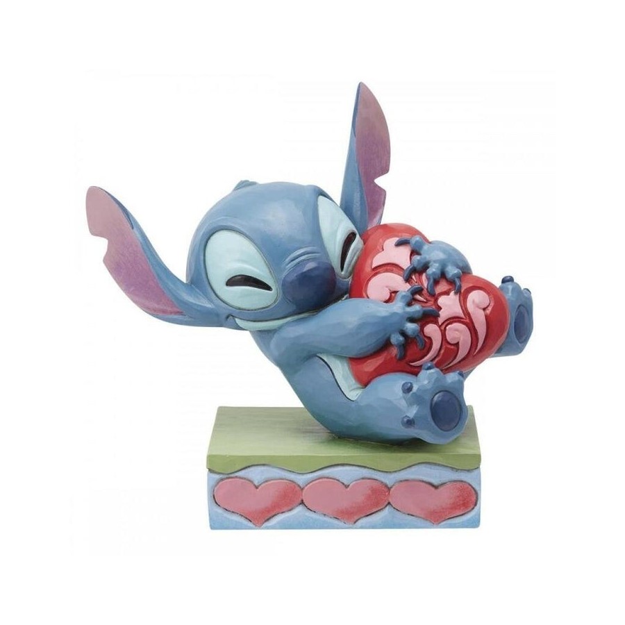 Figura enesco disney stitch abrazando un corazón