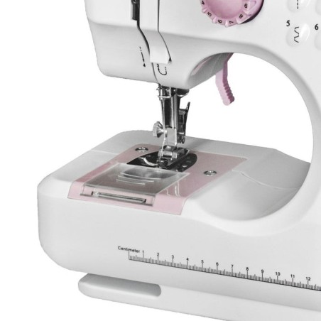 Máquina de coser mini lucznik